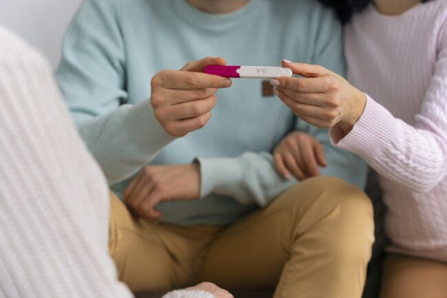 front-view-happy-family-expecting-baby